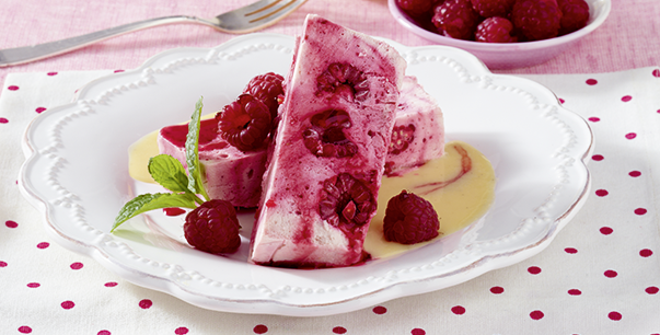 Raspberry parfait with vanilla sauce