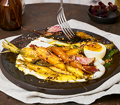 Honey-glazed rainbow carrots on labneh